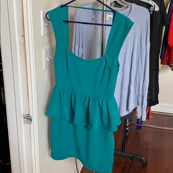 Beautiful Green Peplum Dress - Picture 2 of 4